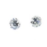 Two brilliant-cut diamonds, weighing 0.33 and 0.29ct. Estimated I-J colour, P1 clarity. PLEASE