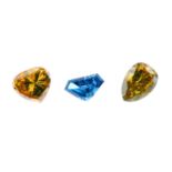 Three coloured diamonds. To include a colour treated 'blue' diamond, together with two further '