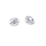 Two brilliant-cut diamonds. Estimated total weight 0.20ct, size range 0.10ct each. PLEASE NOTE