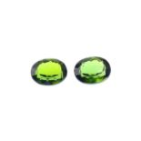 A pair of oval-shape green tourmalines, each weighing 2.94 and 3.08cts. PLEASE NOTE THIS LOT WILL