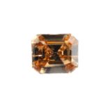 A rectangular-shape coloured diamond, weighing 0.59ct. Estimated fancy dark brown yellowish