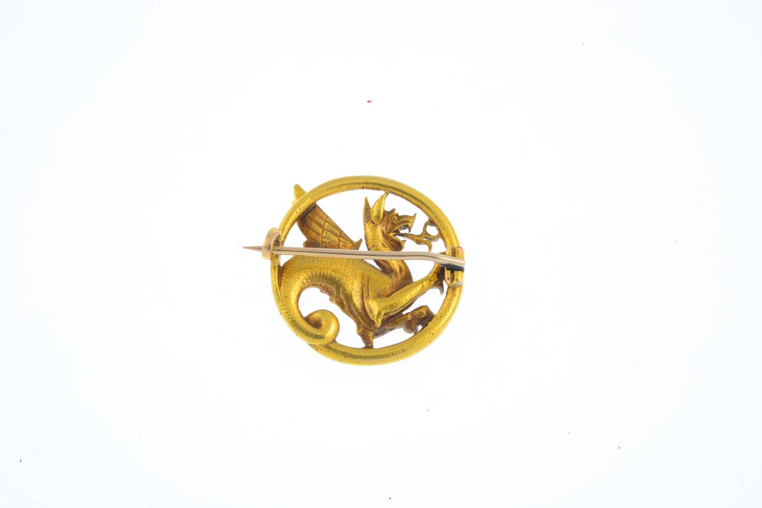 A mid Victorian gold brooch, circa 1870. Designed as a textured chimera, its scrolling tail - Image 2 of 2