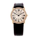 CARTIER - a Ronde Louis Cartier wrist watch. 18ct yellow gold factory diamond set case. Reference