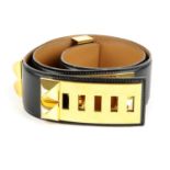 HERMÈS - a Collier De Chien belt. Crafted from smooth black box calfskin leather, featuring a