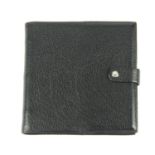 HERMÈS - an address book with inserts. The square-shape address book, with a textured black