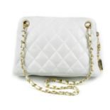 CHANEL - a white quilted leather vintage zip handbag. Featuring a white diamond quilted leather