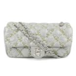CHANEL - a Quilted Tweed Stitch Medium Bubble Flap handbag. Crafted from stuffed nylon with a