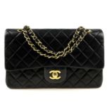 CHANEL - a Medium Classic Double Flap handbag. Designed with maker's iconic diamond quilted black