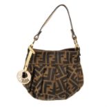 FENDI - a Zucca pouch. Designed with maker's classic tobacco brown zucca canvas exterior, with a