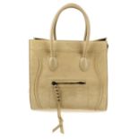 CÉLINE - a Medium Luggage Phantom handbag. Designed with a beige suede exterior, featuring a front