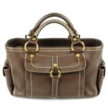 CÉLINE - a brown Boogie Front Pocket handbag. Featuring a brown grained leather exterior with