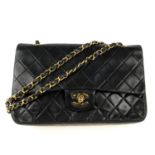 CHANEL - a Medium Classic Double Flap handbag. Designed with maker's iconic diamond quilted black