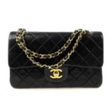 CHANEL - a Small Vintage Classic Double Flap handbag. Designed with maker's iconic diamond quilted