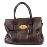 MULBERRY - a brown Bayswater handbag. Crafted from brown grained leather, featuring double rolled