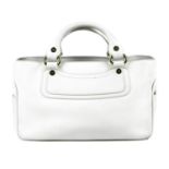 CÉLINE - a white leather Boogie handbag. Designed with an open top, pale gold-tone logo engraved