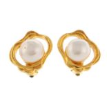 CHANEL - a pair of vintage clip-on earrings. Featuring imitation pearls with textured, wave like