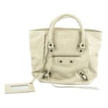 BALENCIAGA - a beige Sunday Tote handbag. Crafted from distressed beige leather, featuring maker's
