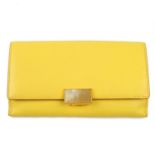 SMYTHSON - a pale yellow Continental wallet. Featuring a front clip fastening, opening to coin