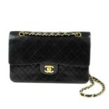 CHANEL - a vintage Medium Classic Double Flap handbag. Designed with maker's iconic diamond