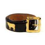 MOSCHINO - a vintage belt. Crafted from patent black leather, featuring polished gold-tone cows