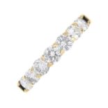 An 18ct gold diamond half eternity ring. Designed as a slightly graduated brilliant-cut diamond