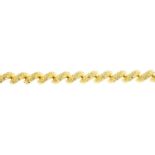 A bracelet. Designed as a textured, scrolling line, with partially concealed clasp. Length 18.