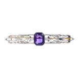 An early 20th century gold and platinum amethyst and diamond brooch. Of openwork design, the