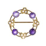 An early 20th century split pearl and amethyst brooch, and a pair of earring. The brooch designed as