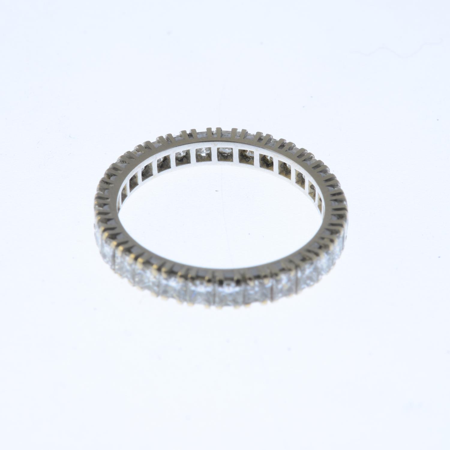 A diamond full eternity ring. Designed as a square-shape diamond line. Estimated total diamond - Image 2 of 3