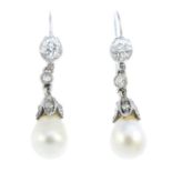 A pair of natural pearl and diamond earrings. Each designed as a natural pearl, weighing 4.81 and
