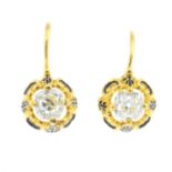 A pair of late Victorian gold diamond and enamel earrings. Each designed as an old-cut diamond, with
