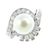 A mid 20th century cultured pearl and diamond dress ring. The cultured pearl, measuring 9.2mms, with