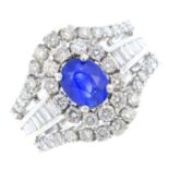 A sapphire and diamond dress ring. Of openwork design, the oval-shape sapphire and brilliant-cut