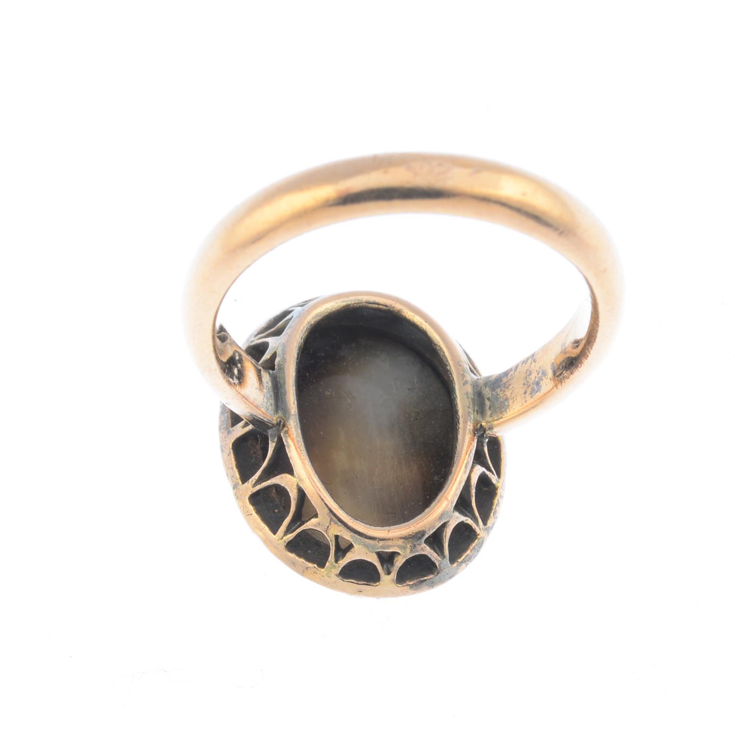 A mid Victorian gold agate cameo diamond cluster ring. The onyx cameo carved to depict a man with - Image 2 of 3