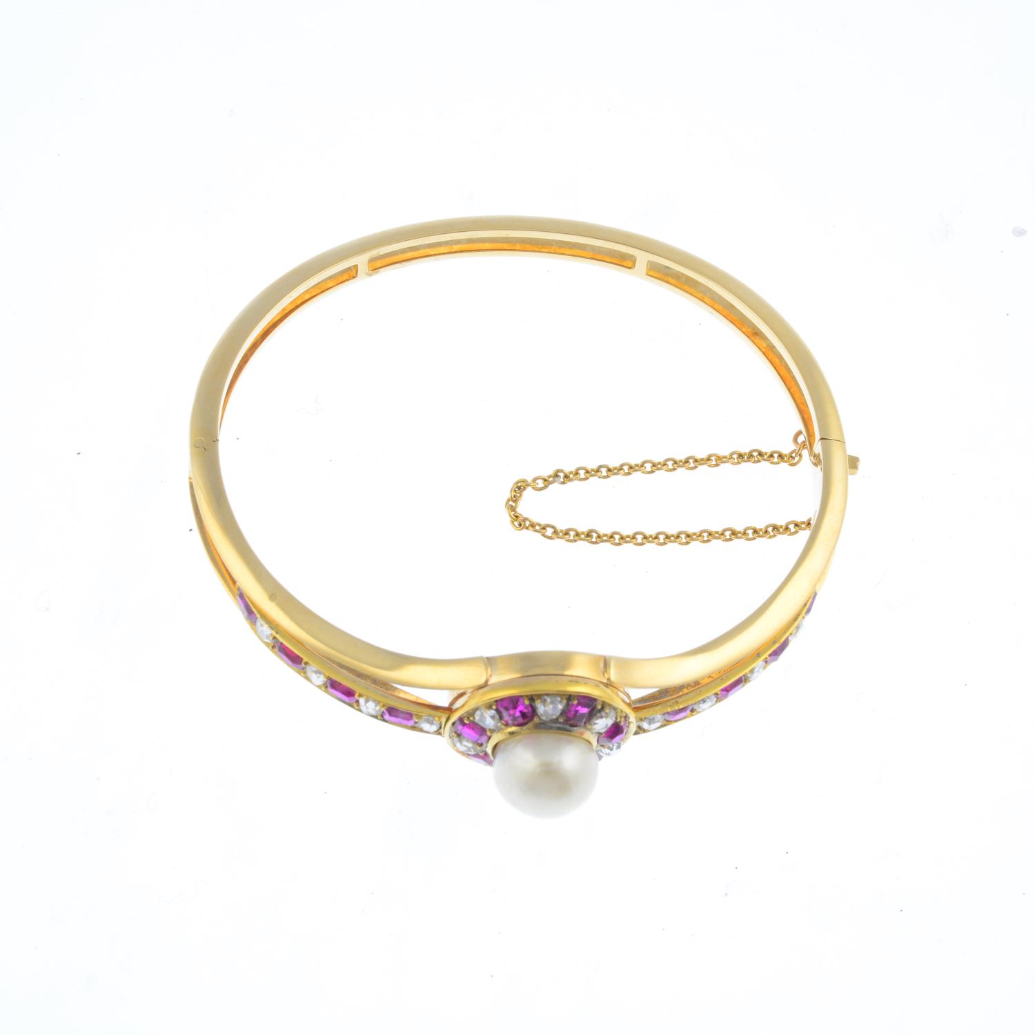 A natural pearl, Burmese ruby and diamond hinged bangle. Of openwork design, the pearl, measuring - Image 2 of 3