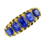 A late Victorian 18ct gold sapphire five-stone ring. Designed as a graduated oval-shape sapphire