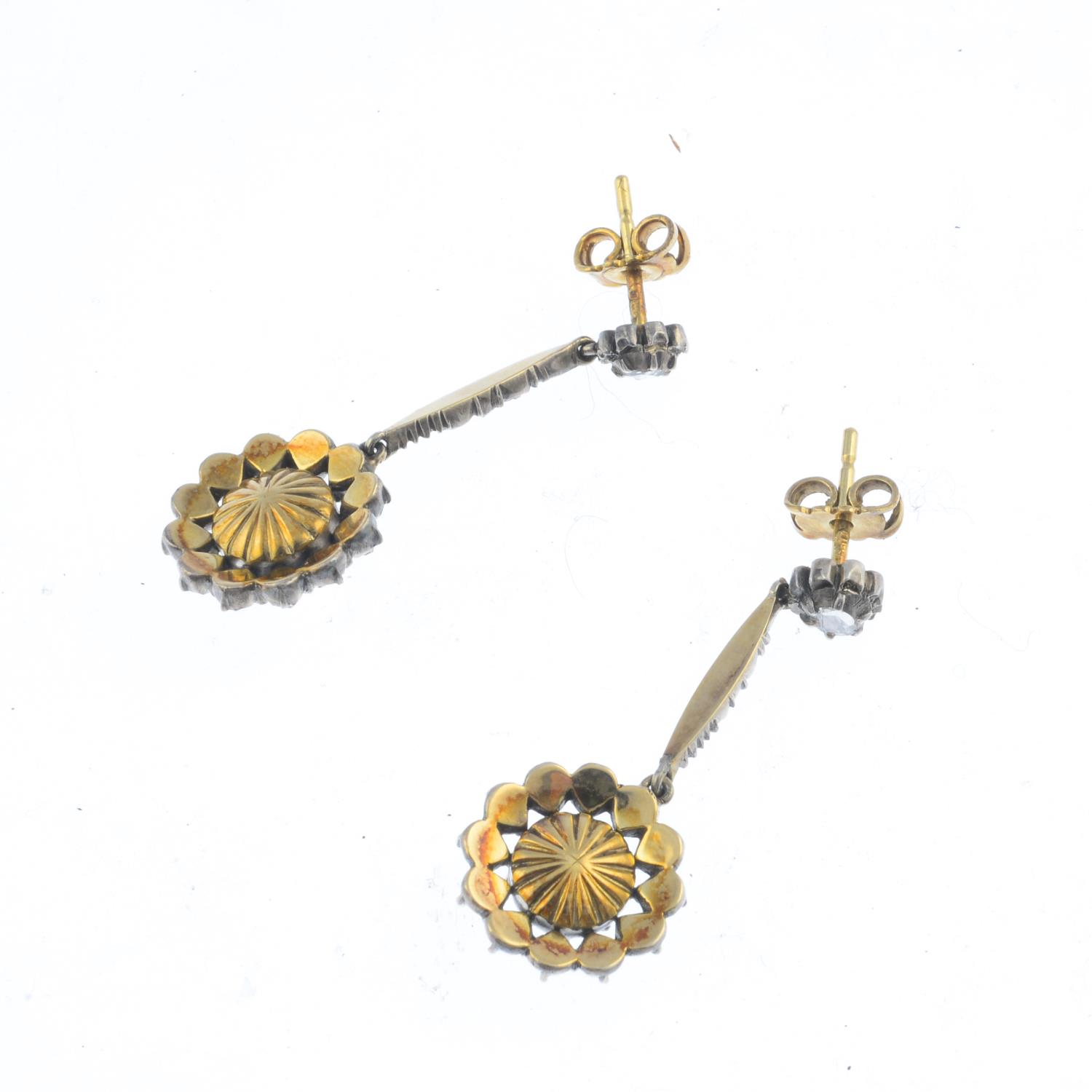 A pair of diamond earrings. Each designed as a rose-cut diamond openwork cluster, suspended from a - Image 2 of 2