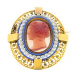 An early Victorian gold cameo brooch. Of openwork design, the agate cameo, carved to depict a lady