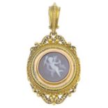 A mid Victorian gold agate cameo pendant. The sardonyx cameo carved to depict the Genius of Light,