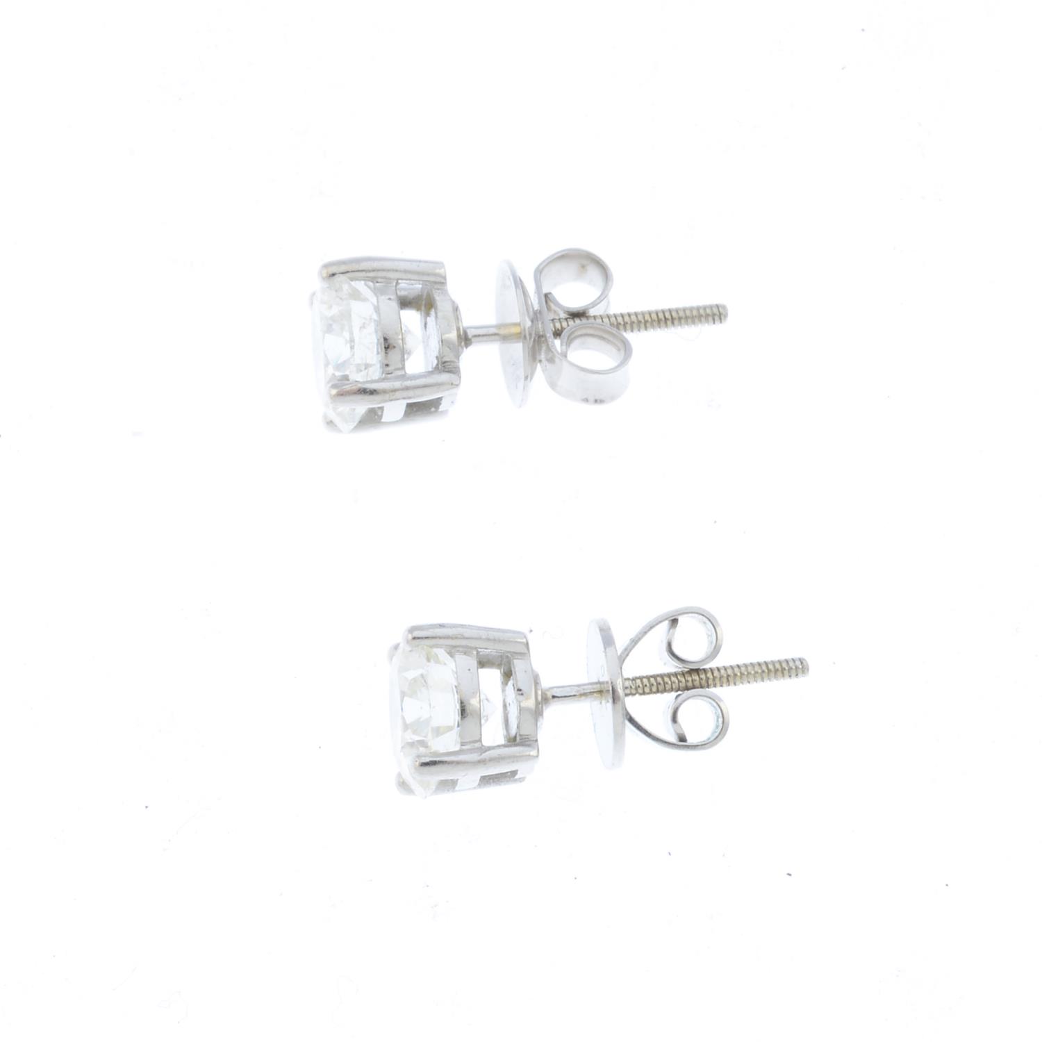 A pair of brilliant-cut diamond stud earrings. Estimated total diamond weight 2.20cts, H-I colour, - Image 2 of 2