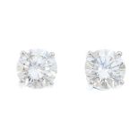 A pair of brilliant-cut diamond stud earrings. Estimated total diamond weight 2.20cts, H-I colour,