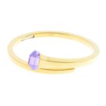 GUCCI - an 18ct gold amethyst 'Chiodo' hinged bangle. Designed as a stylised nail, the tapered