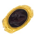 A Roman gold ring. The oval carnelian panel, carved to depict Achilles confronting Hector, with