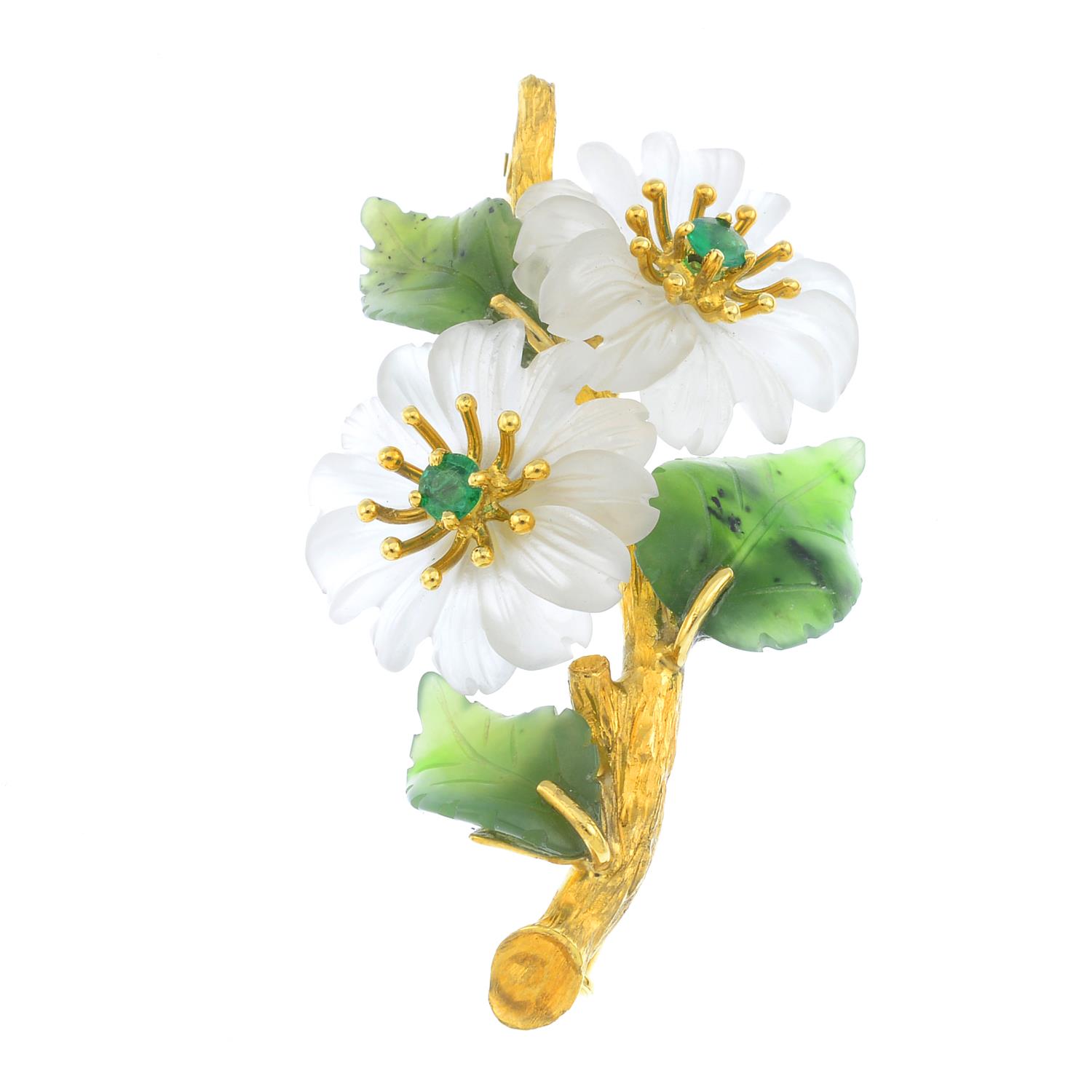 An emerald, chalcedony and nephrite jade floral brooch. The circular-shape emerald and chalcedony