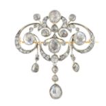 An early 20th century silver and gold diamond brooch. Of openwork design, the foliate panel with