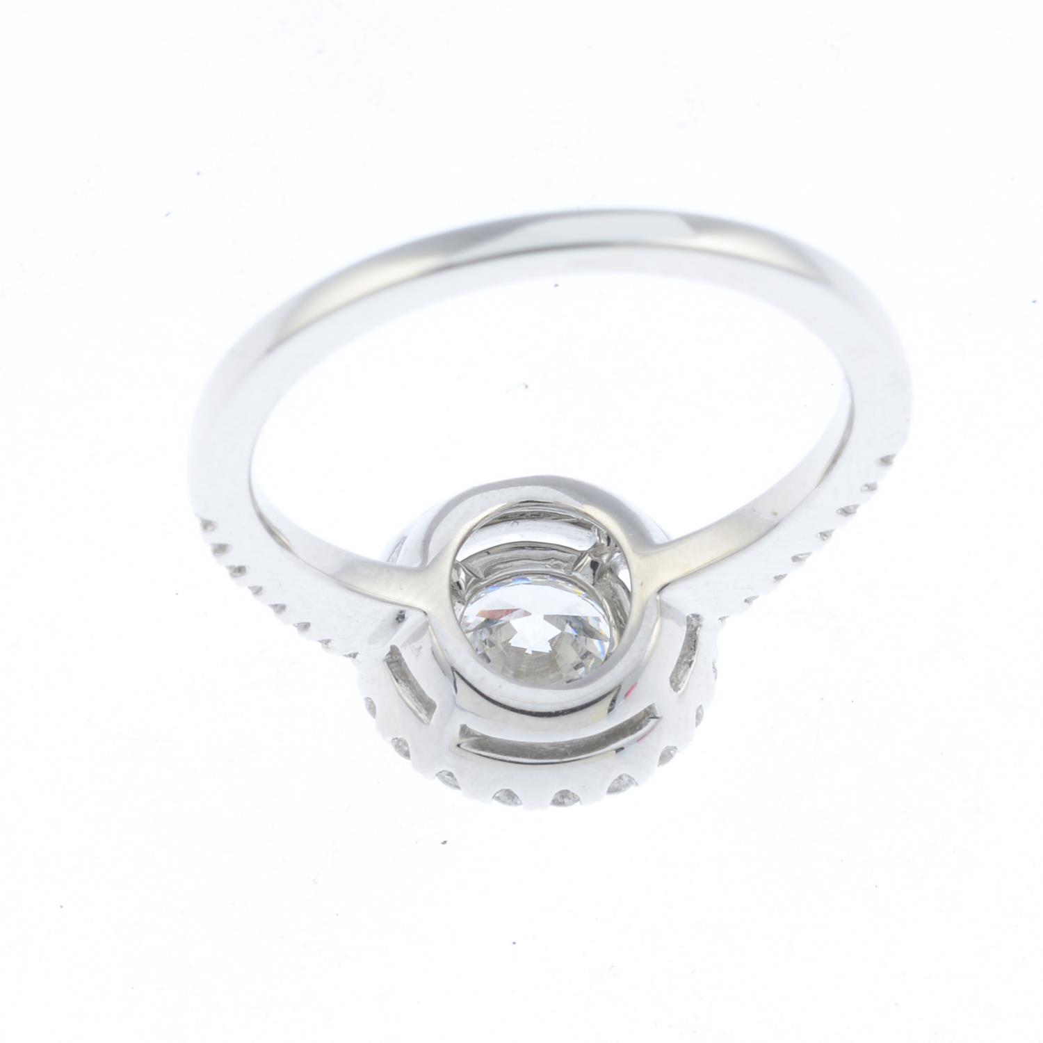 A diamond single-stone ring. The brilliant-cut diamond collet, weighing 1.14cts, with similarly- - Image 2 of 4