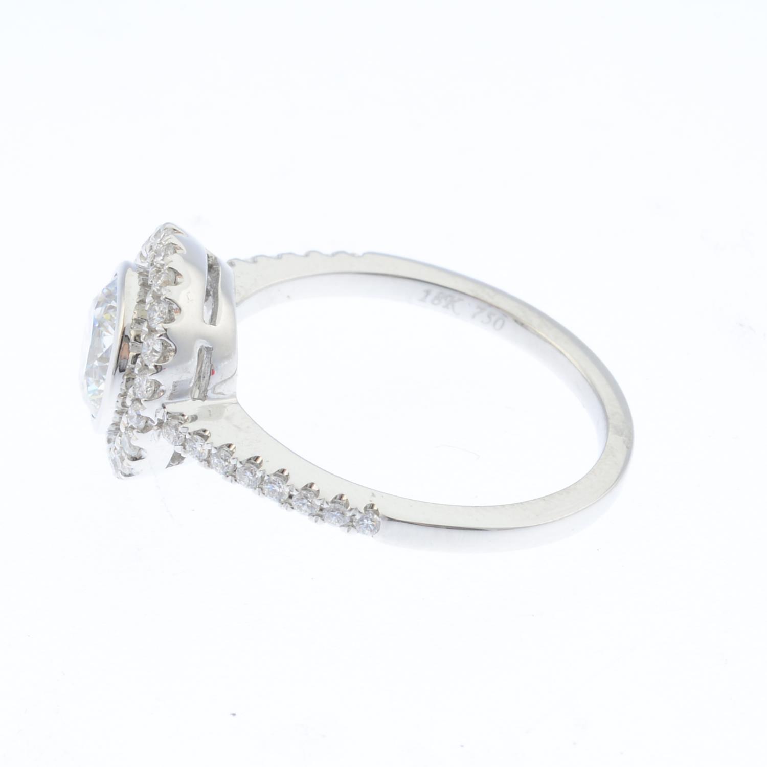 A diamond single-stone ring. The brilliant-cut diamond collet, weighing 1.14cts, with similarly- - Image 3 of 4