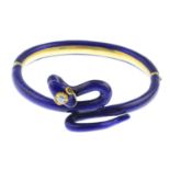 A pre-Revolutionary Russian gold, diamond, ruby and enamel hinged snake bangle. Designed as a blue