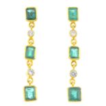 A pair of 18ct gold emerald and diamond earrings. Each designed as a graduated rectangular-shape