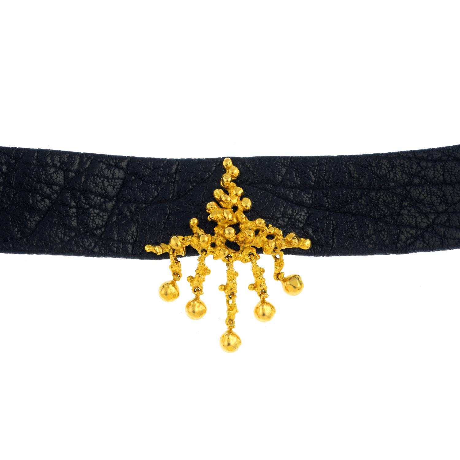 GUBELIN - a mid 20th century 'Lady G' choker. Designed as an openwork, free form triangular panel,